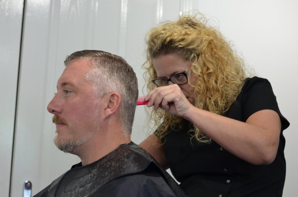 His wife, children and now it’s this man’s turn to be groomed…